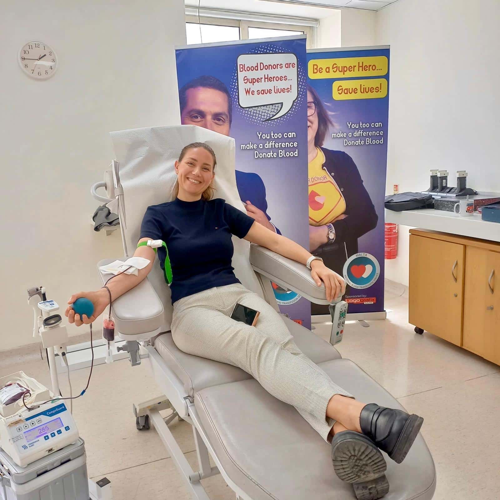 a girl donating blood